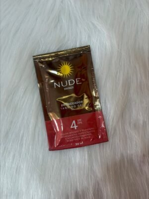 7702044239356 Bronceador nude spf 4 sobre · 20 ml